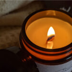 The Candle Brand Burn and Bloom candle burning close up