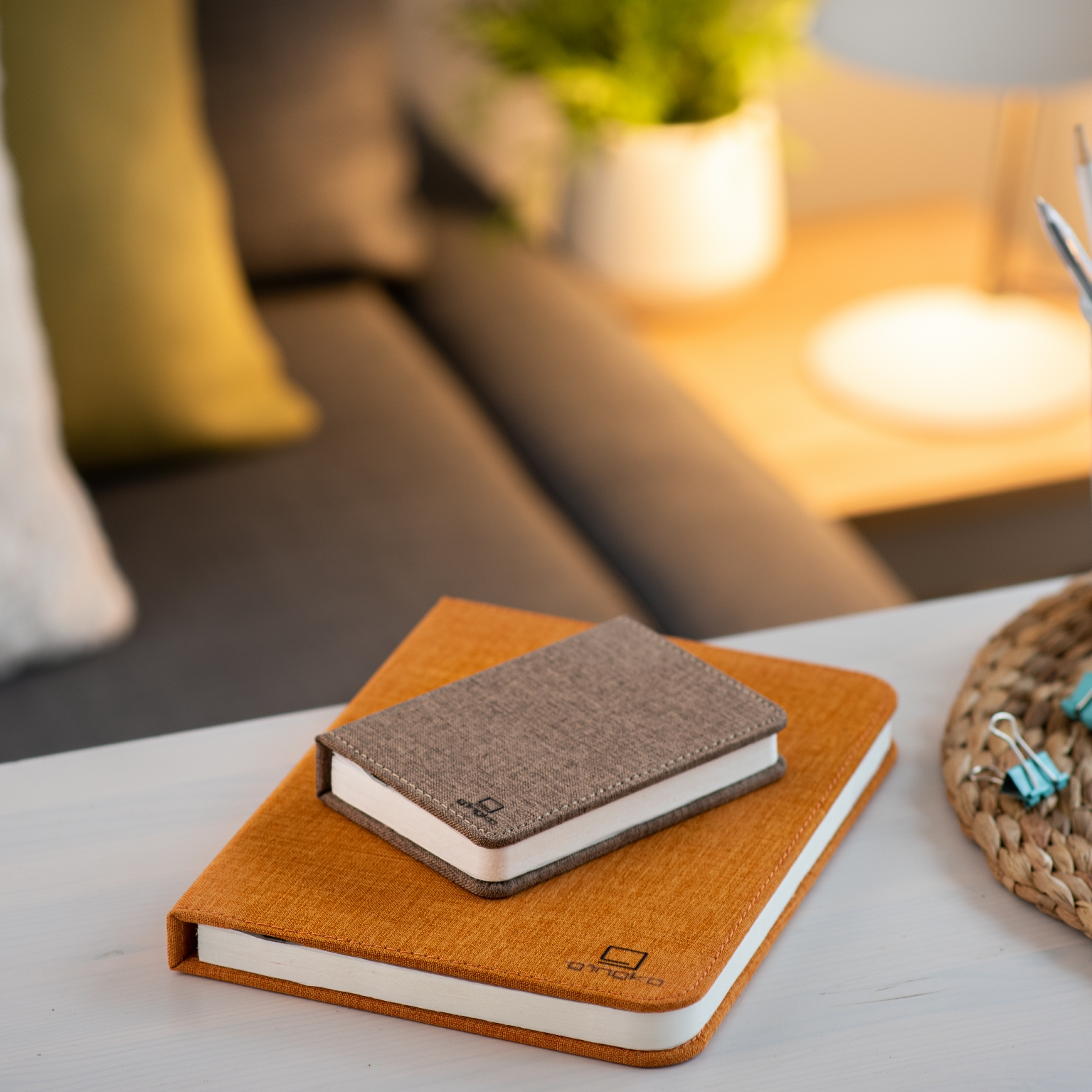 Gingko smart mini book light in coffee placed on larger book light