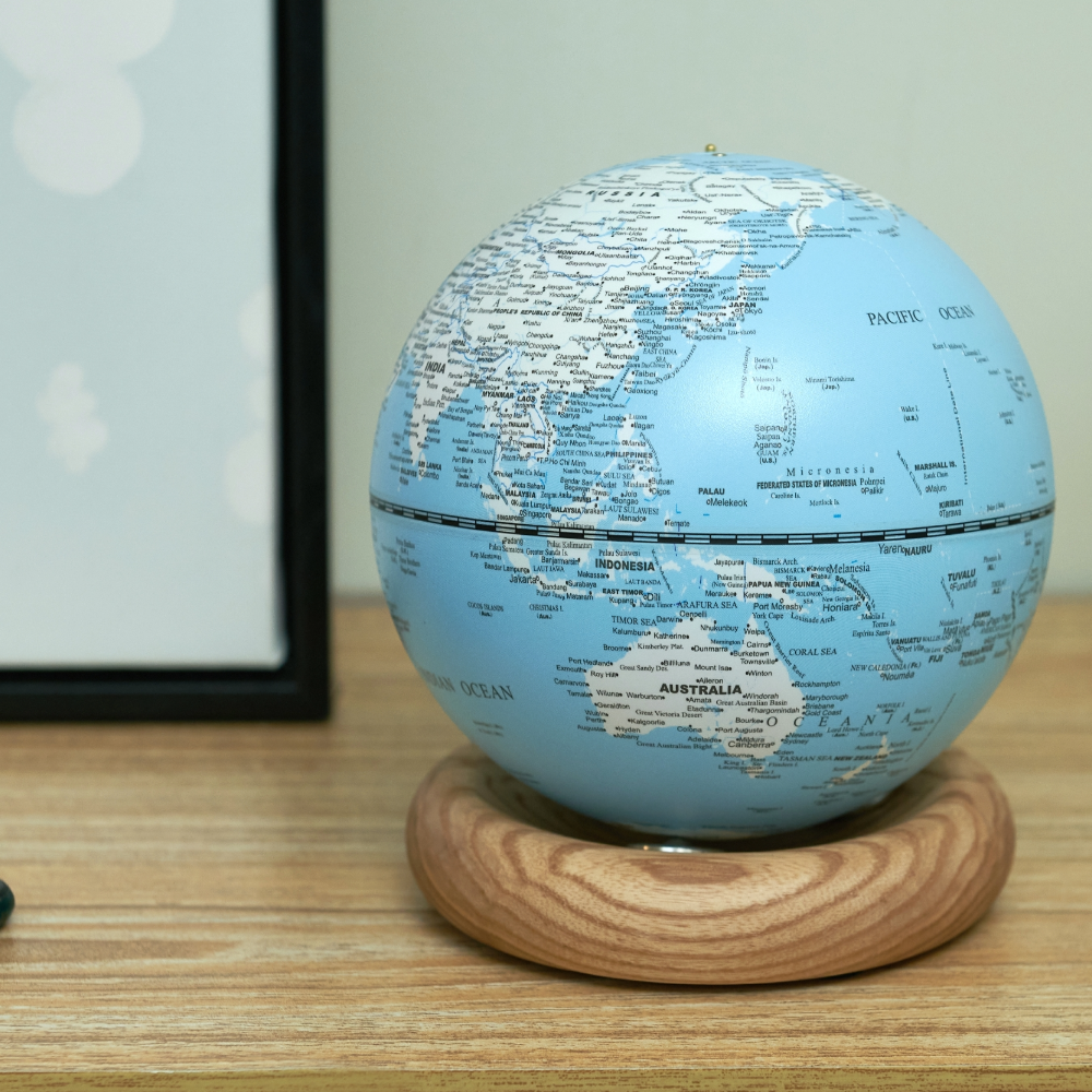Gingko Mini Light Blue Atlas Globe with White Ash Base unlit